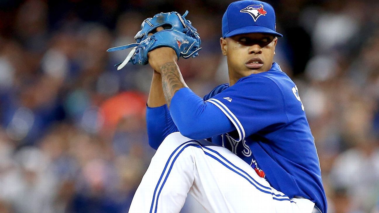 Toronto Blue Jays pitcher Marcus Stroman gives cleats away to shocked young  fan - ESPN