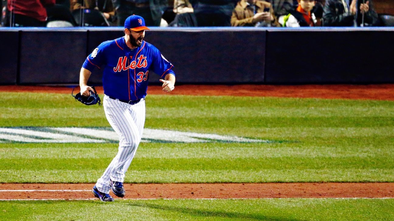 New York Mets David Wright and starting pitcher Matt Harvey stand on the  mound in the 9th inning against the Kansas City Royals in game 5 of the World  Series at Citi