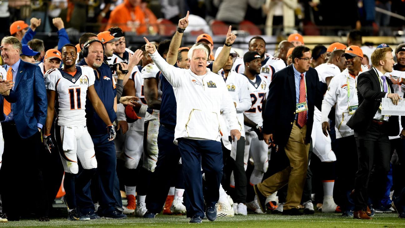 Denver Broncos Head Coach Gary Kubiak is doused with Gatorade by