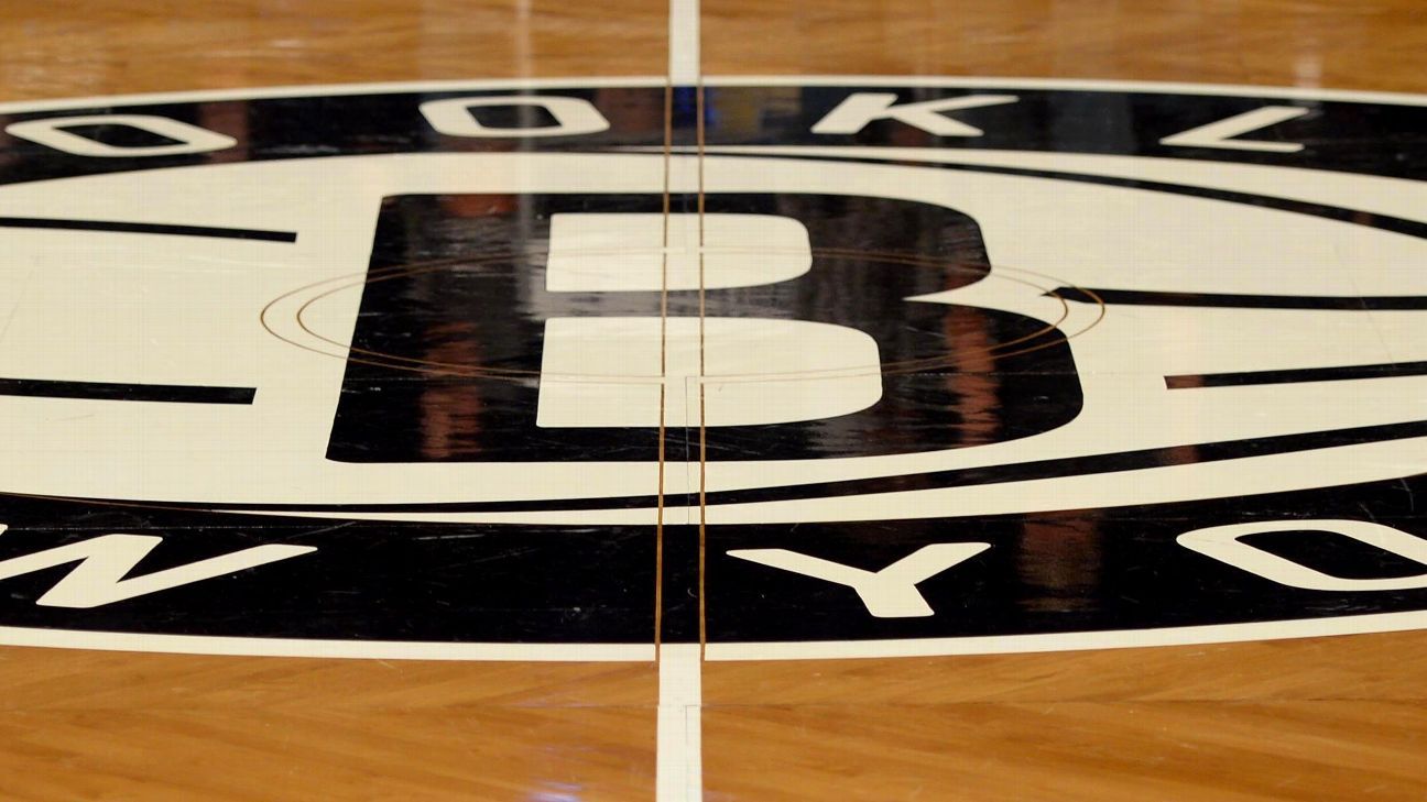 Brooklyn Nets GM says some of his players aren't yet in compliance with New York..