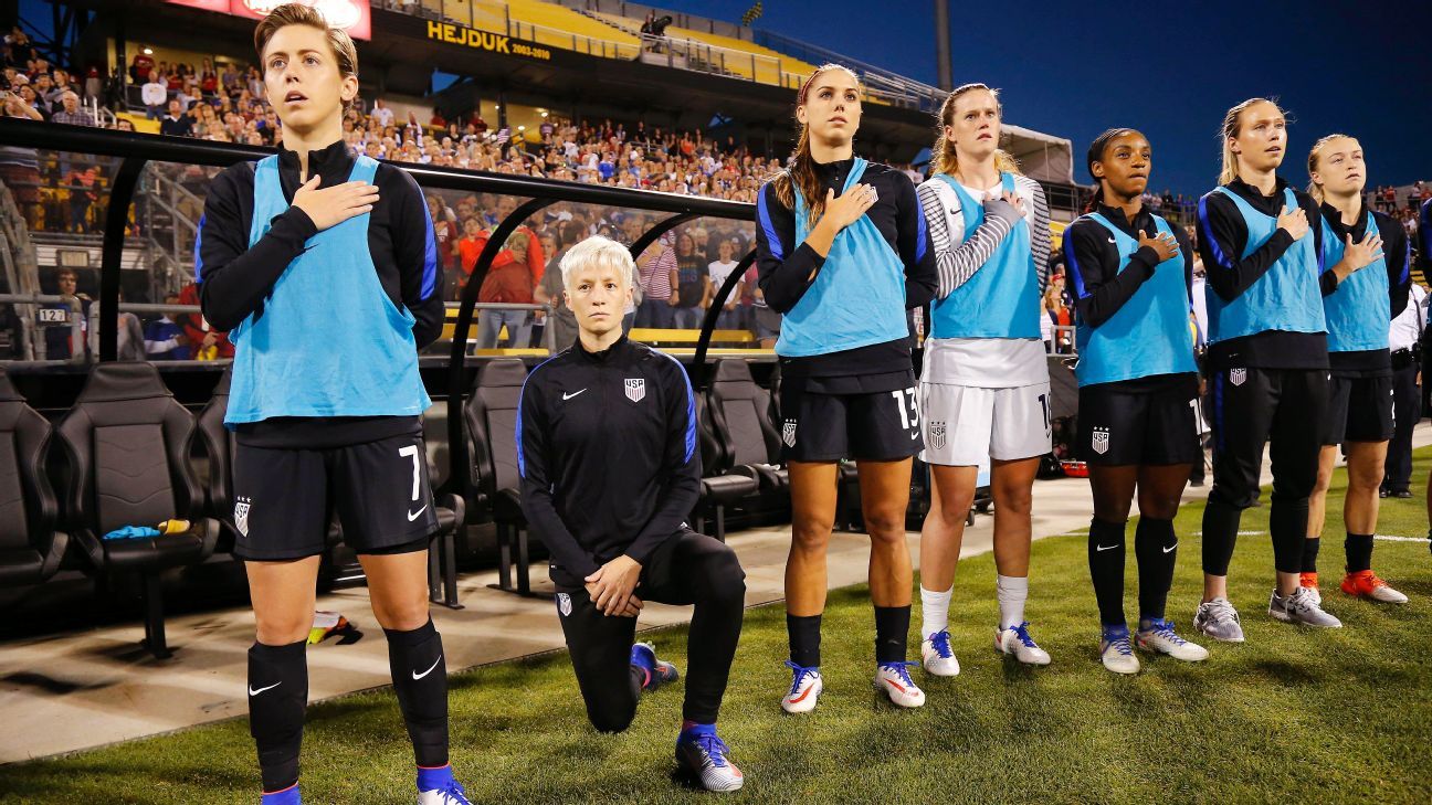 Megan Rapinoe, Wearing a U.S. Uniform, Kneels for the Anthem - The