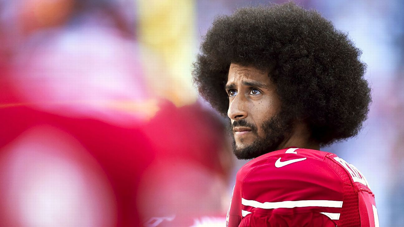 Colin Kaepernick hands out old suits outside parole office - ESPN