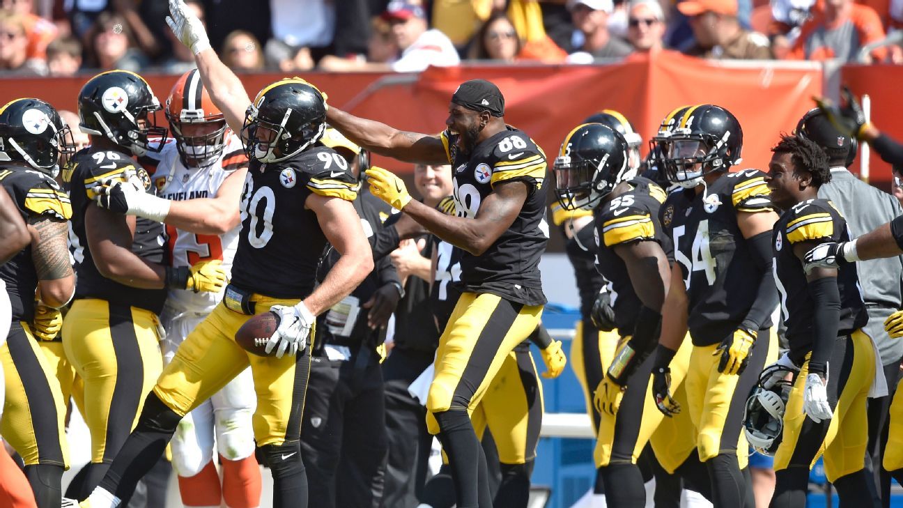 Check out Steelers LB T.J. Watt as he signs a baby at training camp