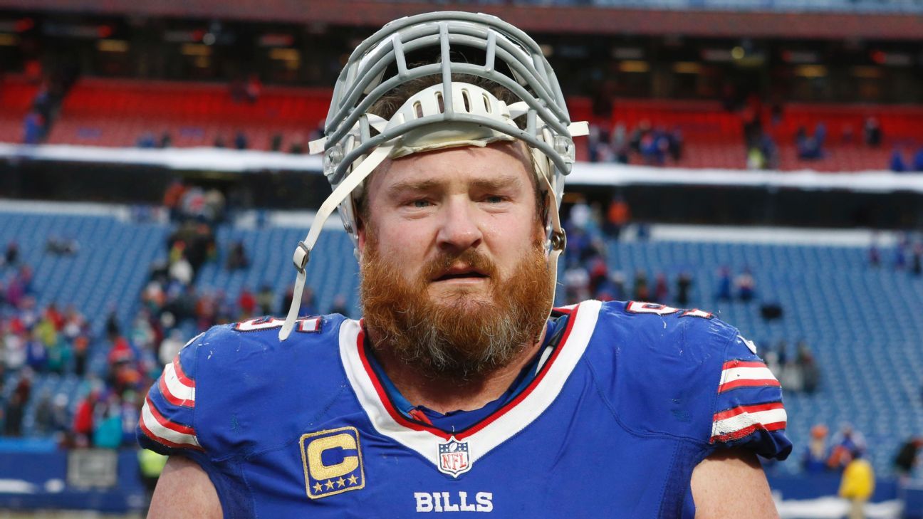 Kyle Williams of the Buffalo Bills talks to teammates on the bench