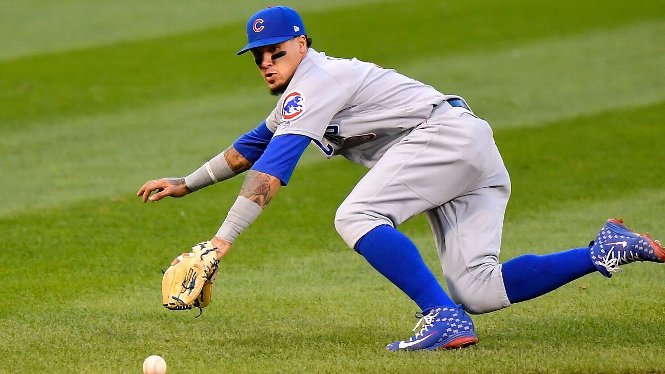 Chicago Cubs Addison Russell makes a catch on a pop up off the bat of St.  Louis Cardinals Magneuris Sierra while Javier Baez waits as a backup in the  sixth inning at