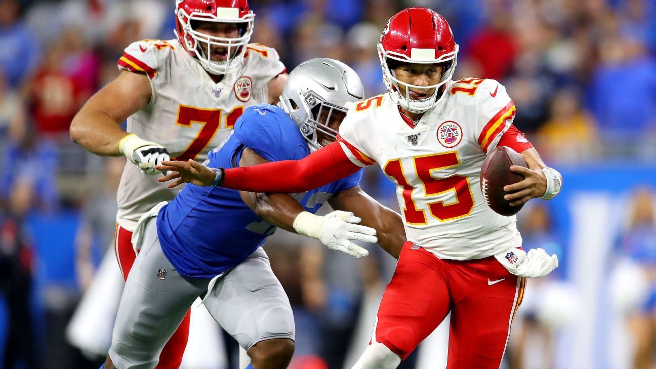 Kansas City Chiefs' Byron Pringle (13) is tackled by Los Angeles