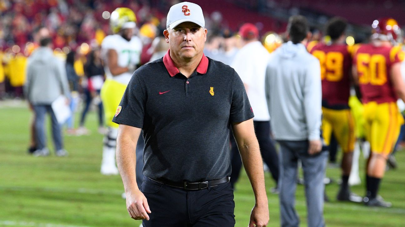 Helton says he's still the best fit to coach Trojans