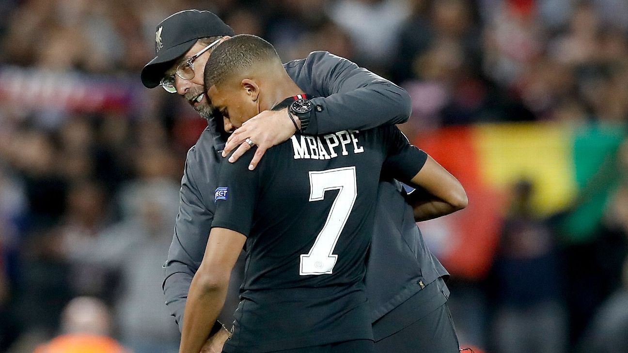 Kylian Mbappe with Liverpool manager Jurgen Klopp.