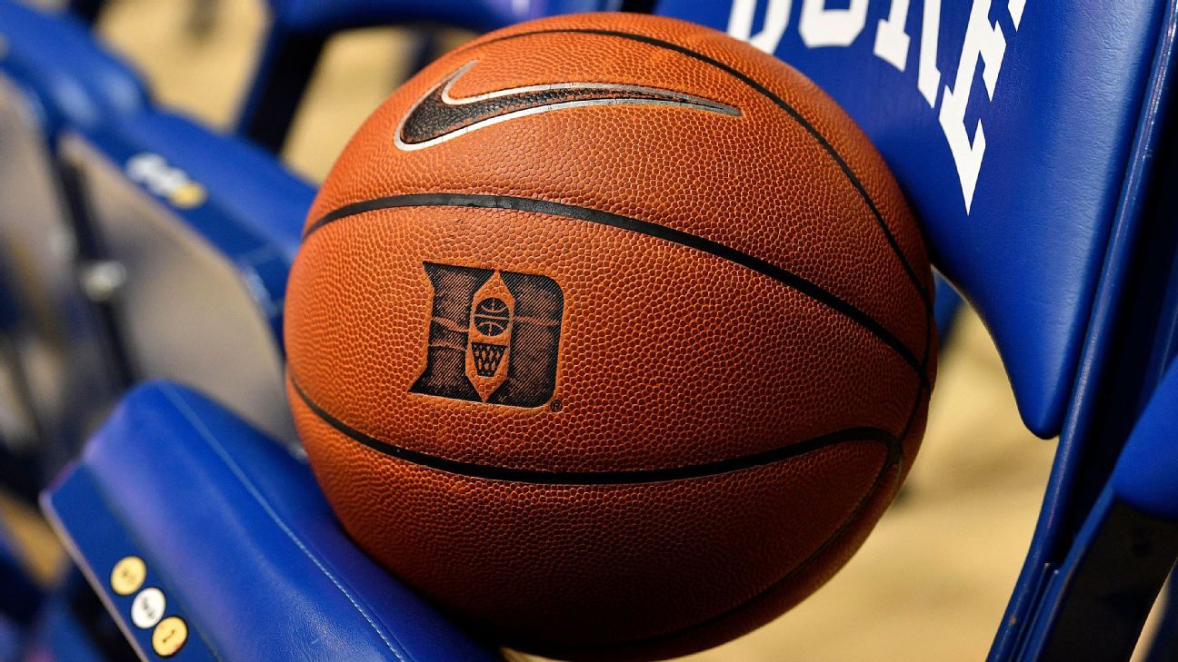 Duke studies the source of the bacteria outbreak in Coach K’s field.