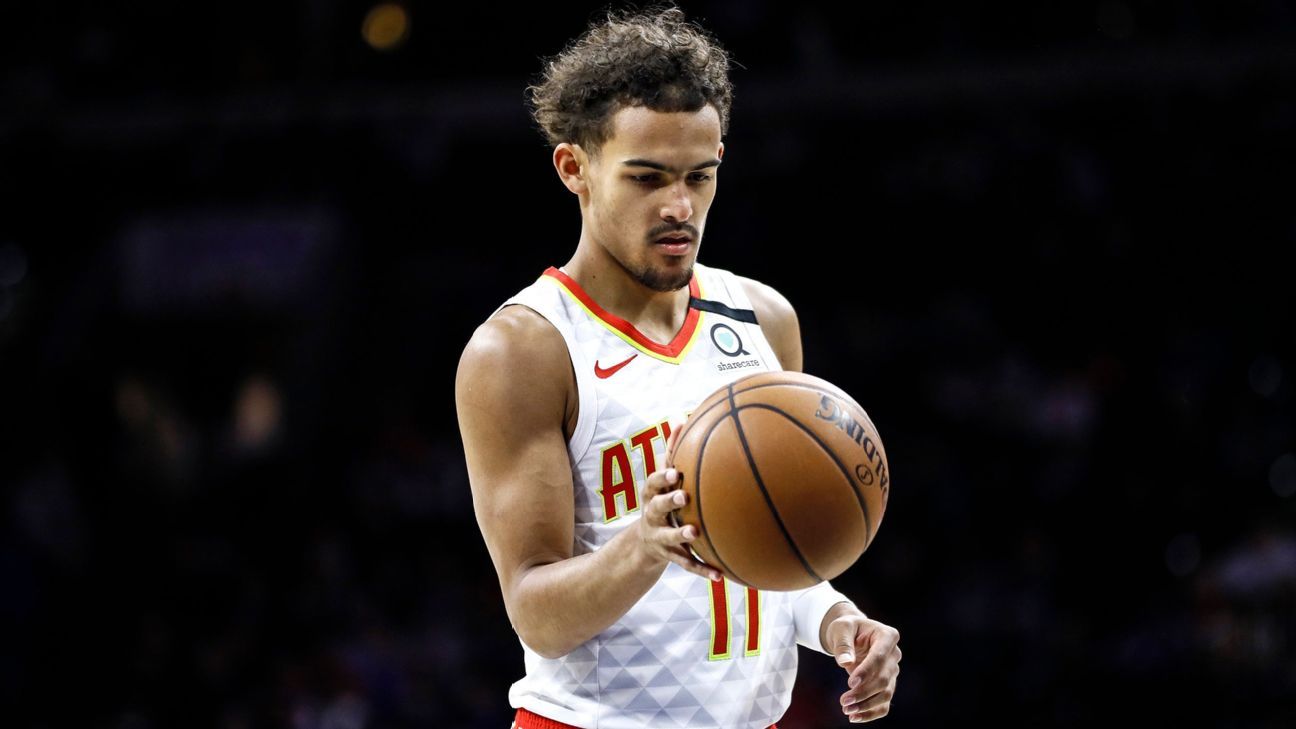 Trae Young of the Atlanta Hawks and Grayson Allen of the Memphis Grizzlies exchange words on Twitter after their feet get tangled