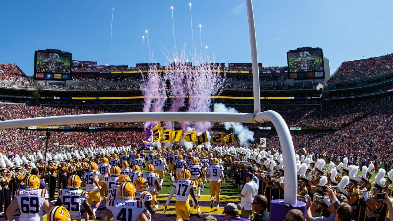 The LSU Tigersenter the field before their home crowd before the Div. 1  NCAA football game between the LSU Tigers and the Florida Gators at Tiger  Stadium in Baton Rouge, La. LSU