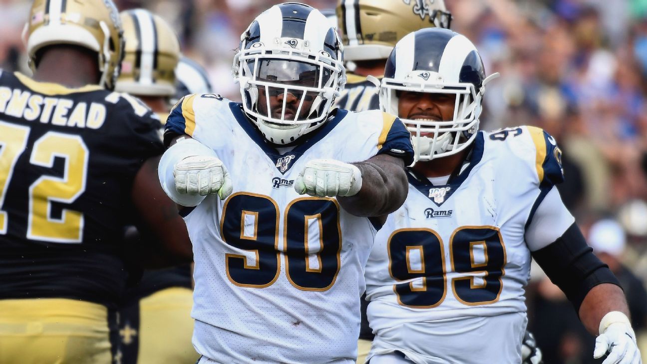 LA Rams re-sign defensive end Morgan Fox, release Tanzel Smart