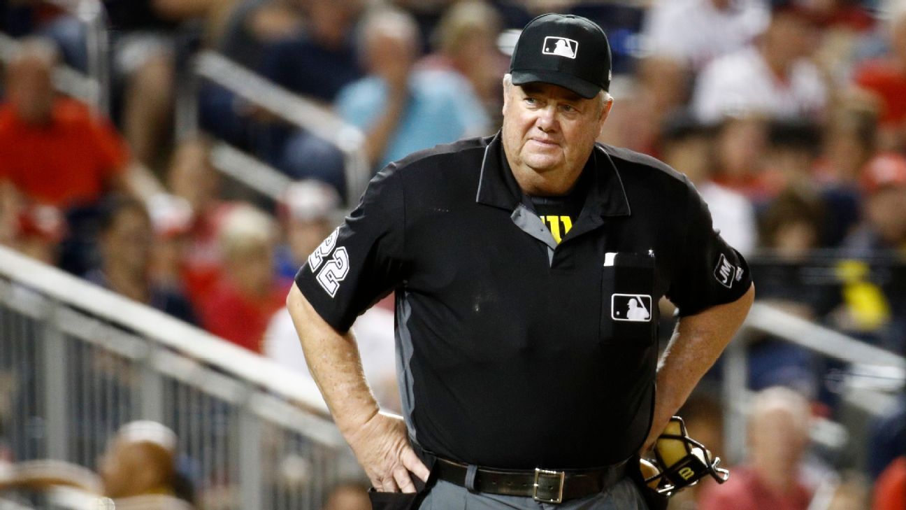 Major League Baseball umpire Joe West wears the initials JK on his uniform  sleeve during a baseball game between the Cincinnati Reds and Washington  Nationals, Saturday, June 5, 2010, in Washington. West