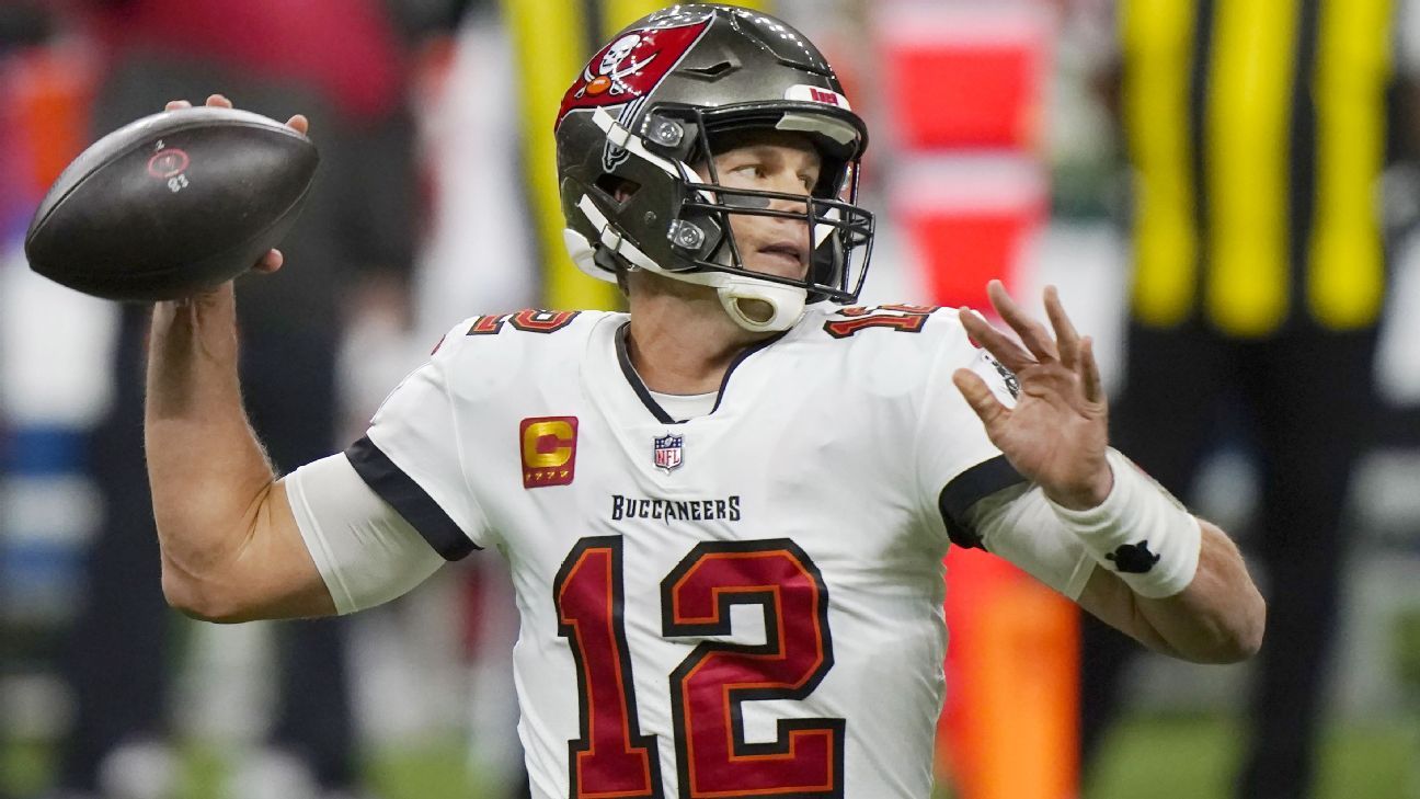 Tom Brady leads the Tampa Bay Buccaneers to their first playoff win since  2002