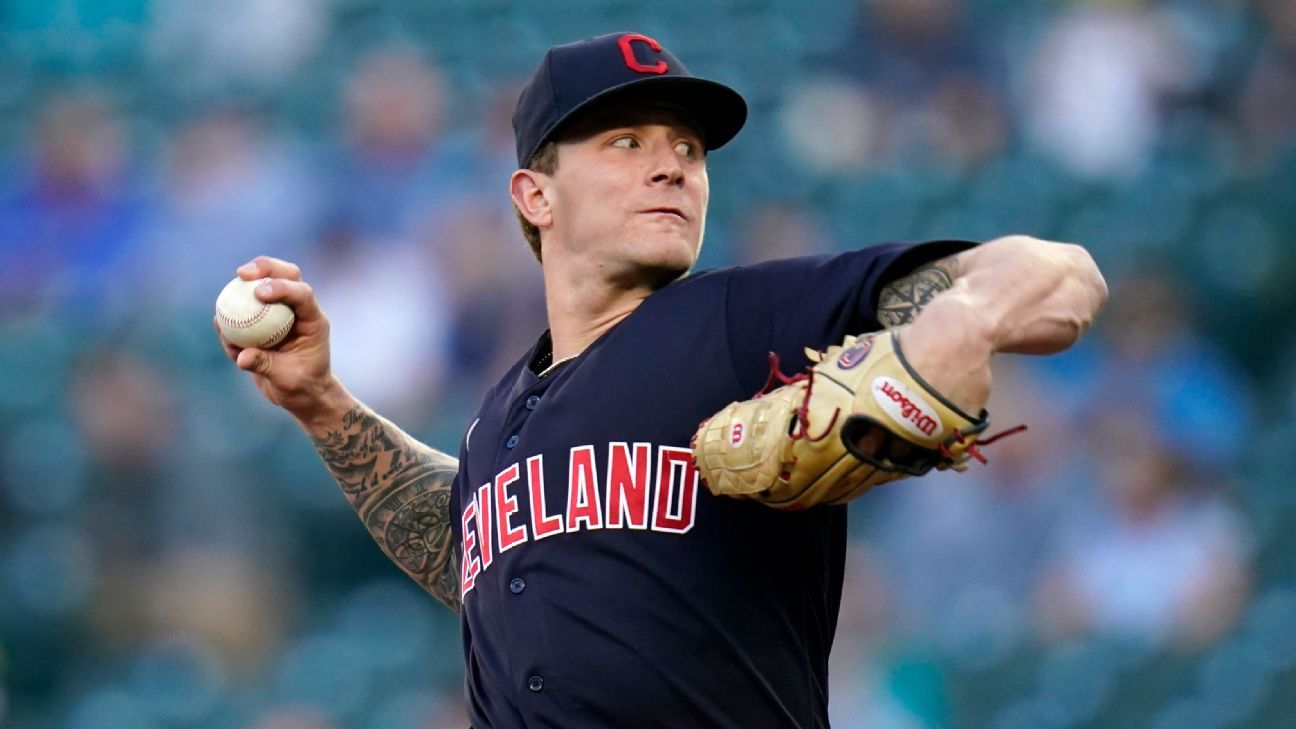 Cleveland Indians pitcher Zach Plesac injuring himself taking off