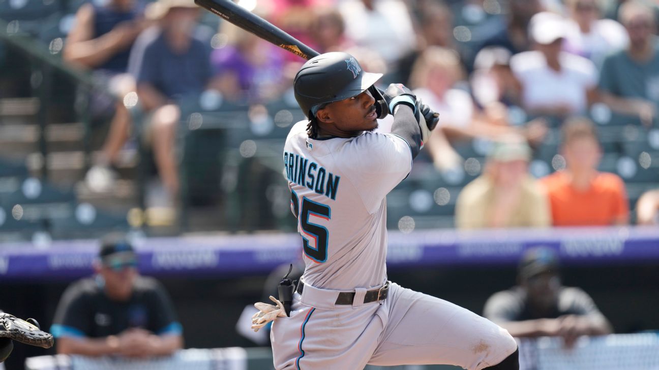 Miami Marlins' Lewis Brinson, after reviewing video, says he hears Rockies fan u..