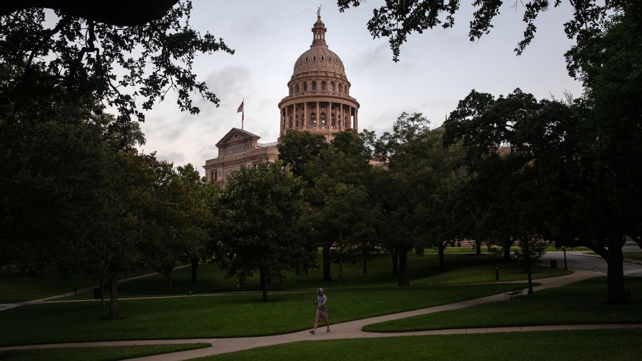 Texas Gov. Greg Abbott signs law restricting transgender student participation i..