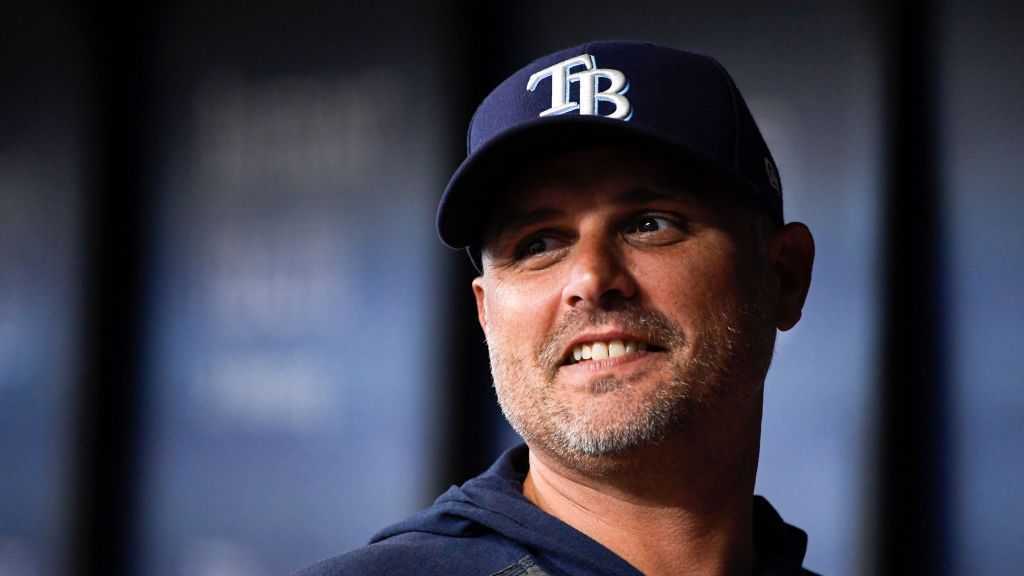 Tampa Bay Rays manager Kevin Cash, center, talks with catcher Mike