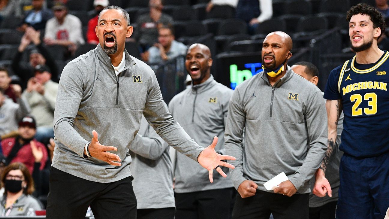 Michigans tränare Juan Howard träffar Wisconsins basketassistent för män efter nederlag