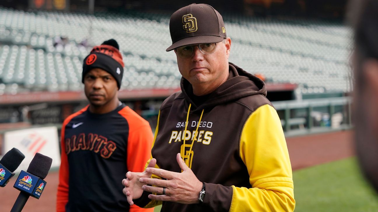 San Francisco Giants first-base coach Antoan Richardson and San Diego Padres thi..