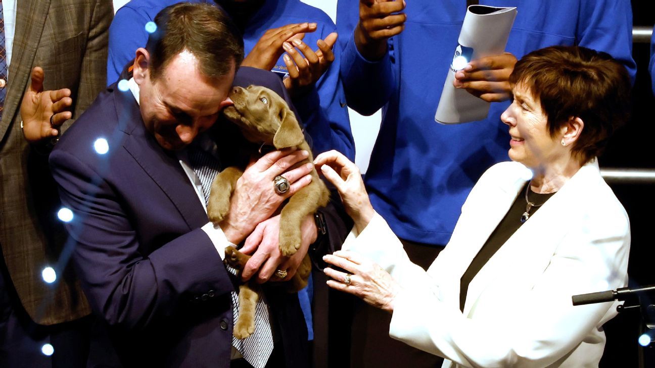 Duke Blue Devils gift Coach K with a puppy