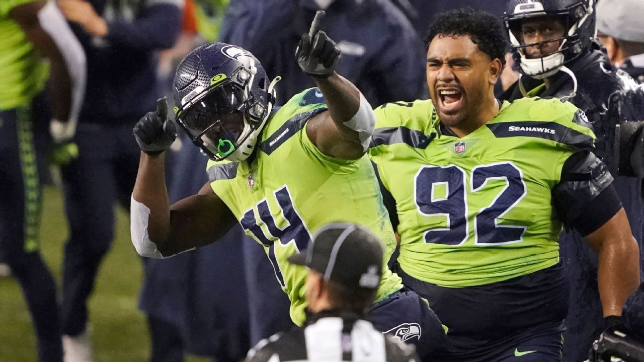 August 26 2022: Seattle Seahawks defensive tackle Bryan Mone (90) losses  his helmet during the 2nd half the NFL Football game between the Seattle  Seahawks and Dallas Cowboys at AT&T Stadium in