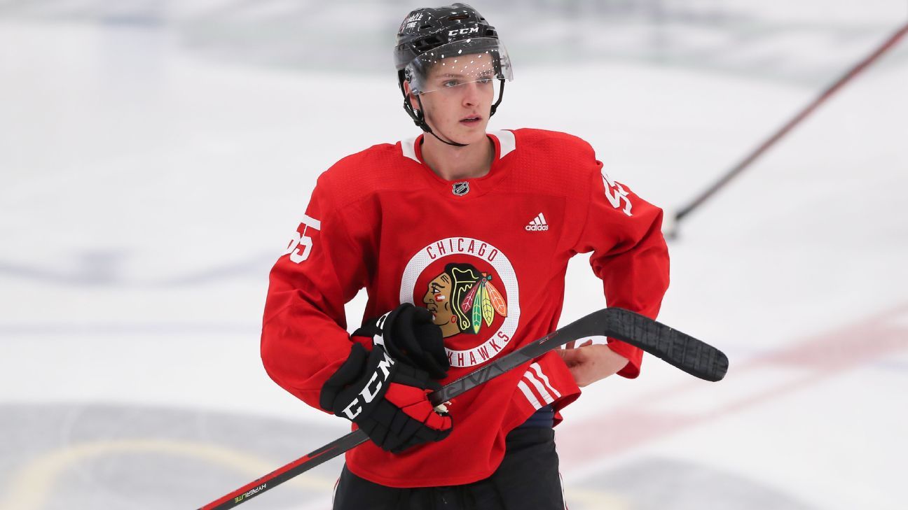 Blackhawks' Kevin Korchinski rejoins team after father's death - ESPN