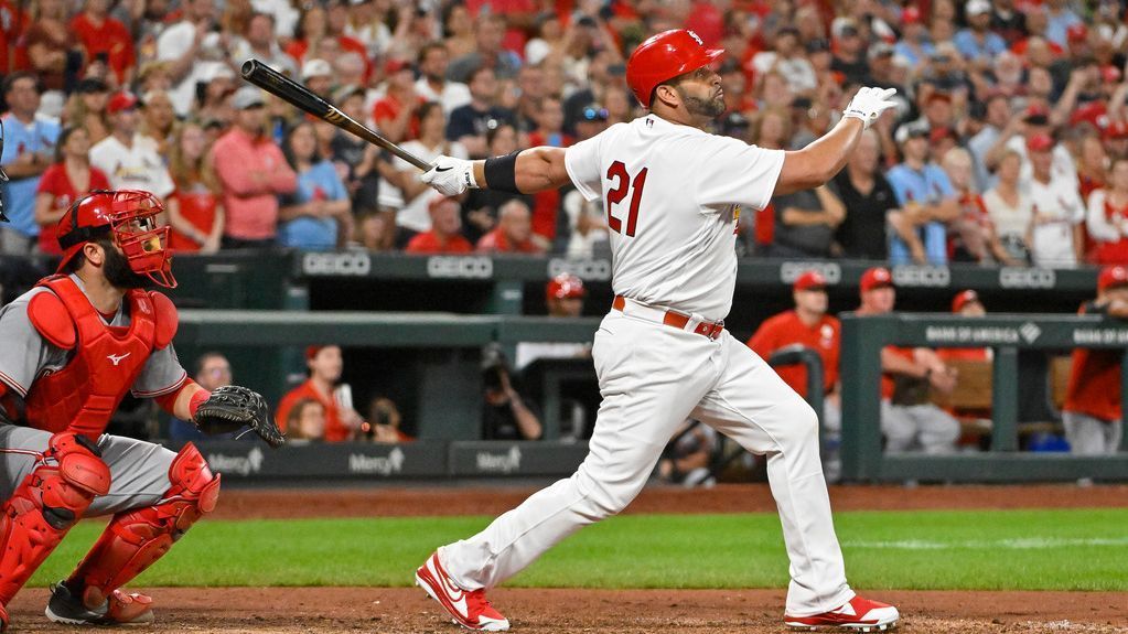 American League's Albert Pujols runs with his son during batting practice  before the Home Run Derby at the 86th All-Star Game at Great American Ball  Park in Cincinnati, Ohio on July 13