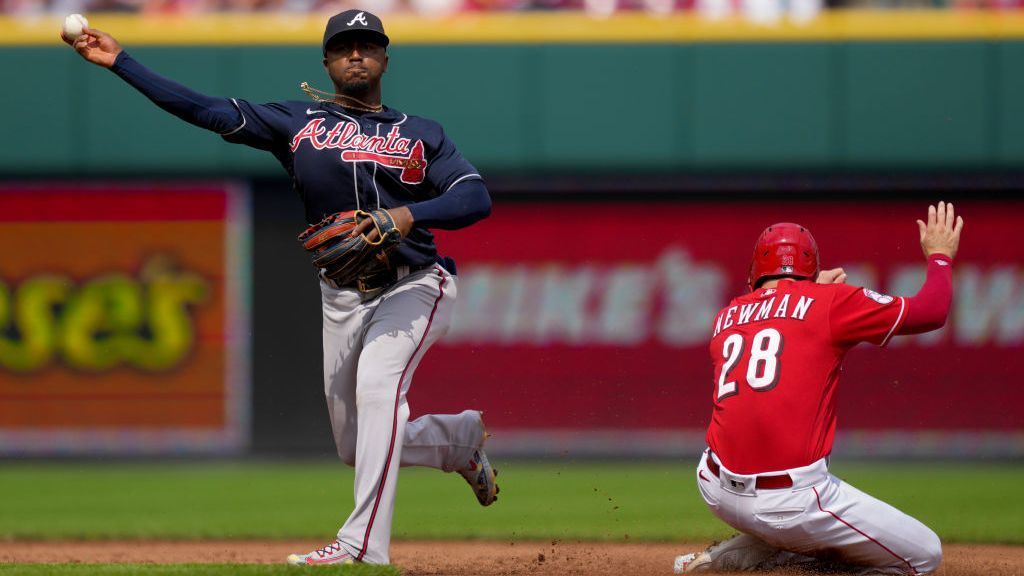 Braves end Reds' 12-game win streak in slugfest