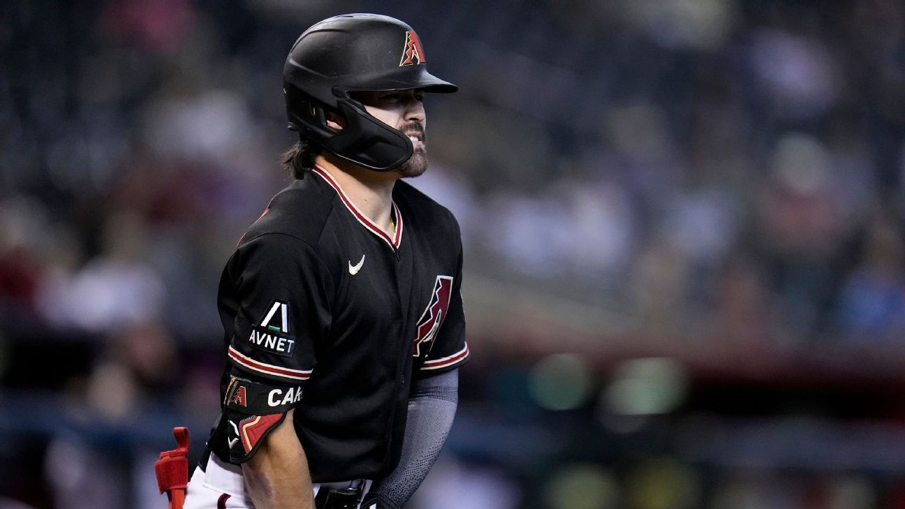 Arizona Diamondbacks' Corbin Carroll follows through on his home run swing  against the Colorado Rockies during the sixth inning of a baseball game  Tuesday, May 30, 2023, in Phoenix. (AP Photo/Ross D.