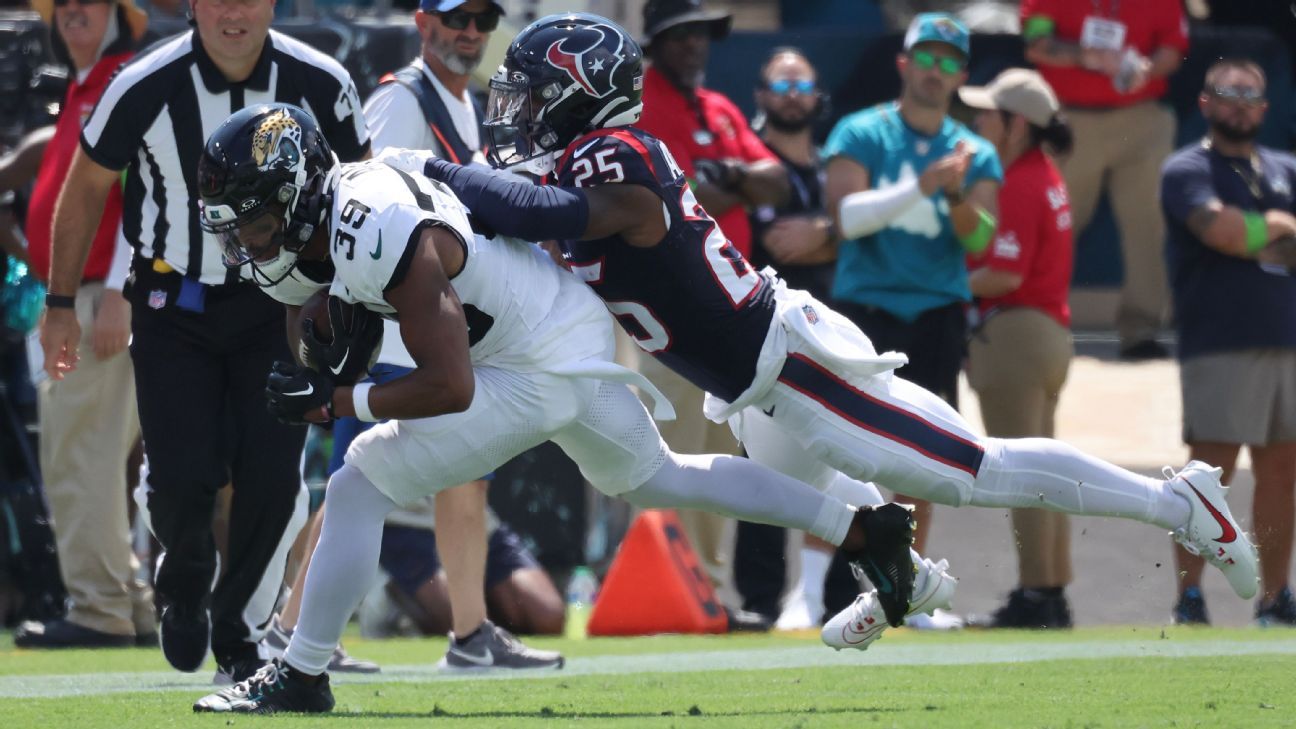 Jacksonville Jaguars receiver Tim Jones (15) covers a kick during an NFL  football game against the