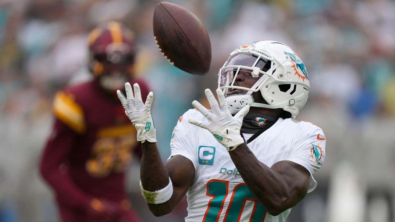 Dolphins’ Tyreek Hill remains just under 2,000 yards receiving with a huge day