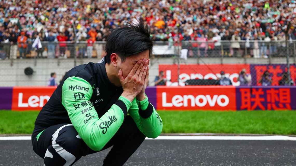 Zhou Guanyu in celebrating home race at the Chinese GP
