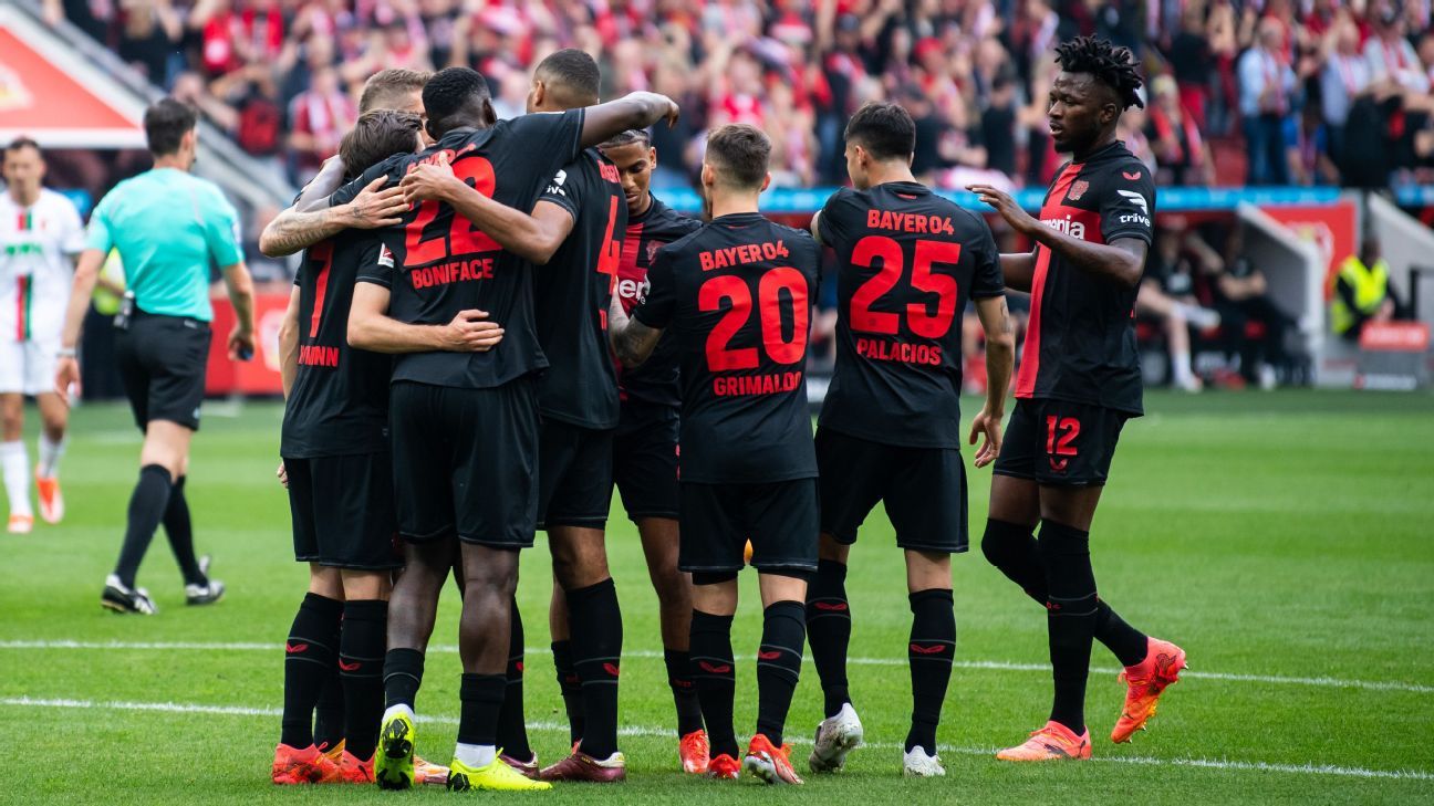 Bayer Leverkusen beat Augsburg 2-1 and set a document by ending the Bundesliga unbeaten.
