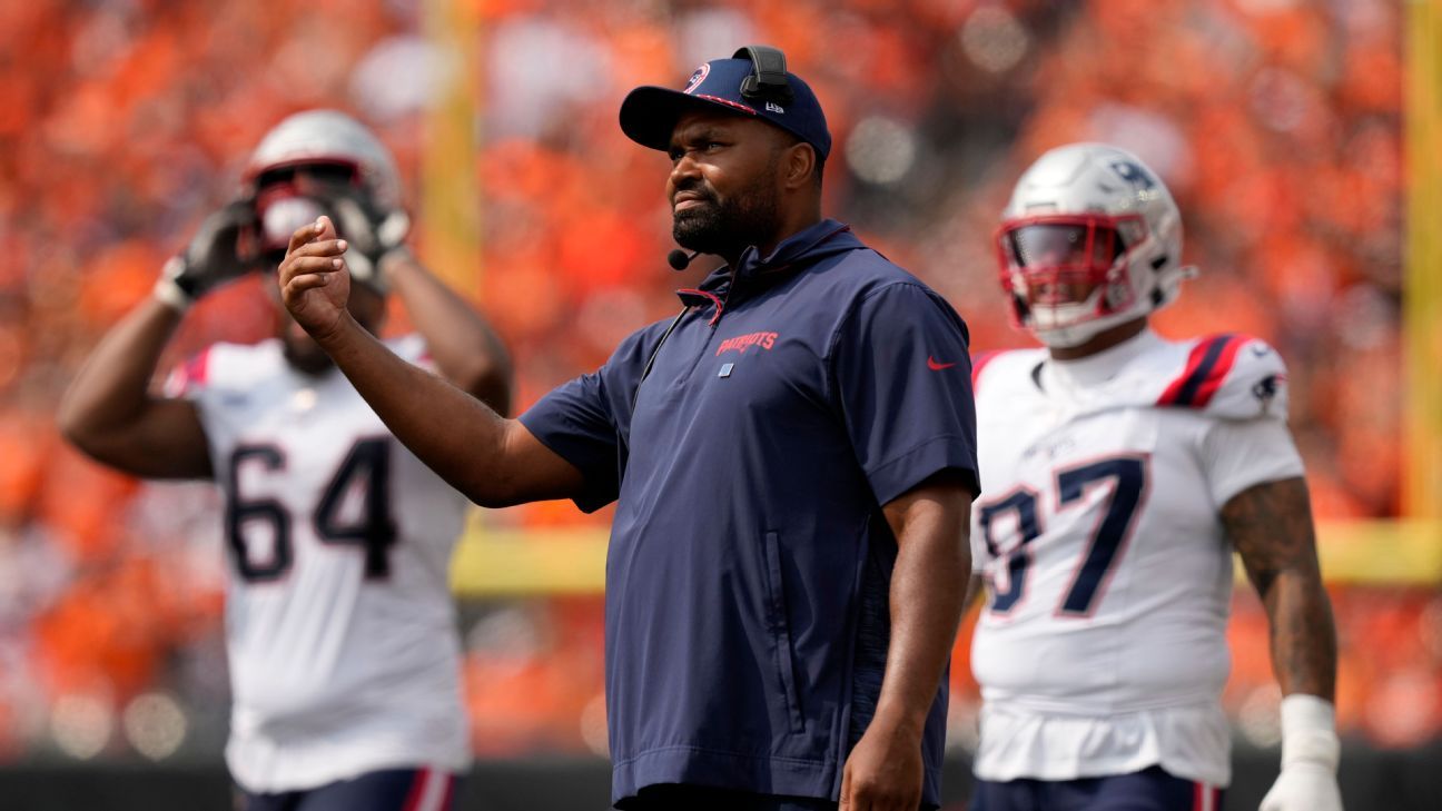 Jerod Mayo of the Patriots receives the game ball after his first win as a coach