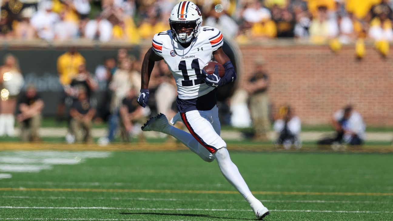 Auburn's Simmons faces domestic assault charge