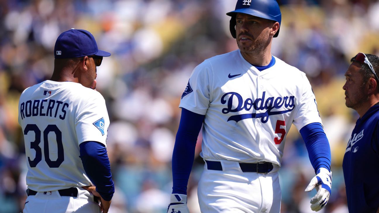 Dodgers' Freeman hit by pitch on left wrist, exits