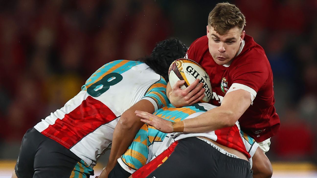 Lions centre Garry Ringrose is whacked by the First Nations-Pasifika defence during the tour game in Melbourne, July 22, 2025