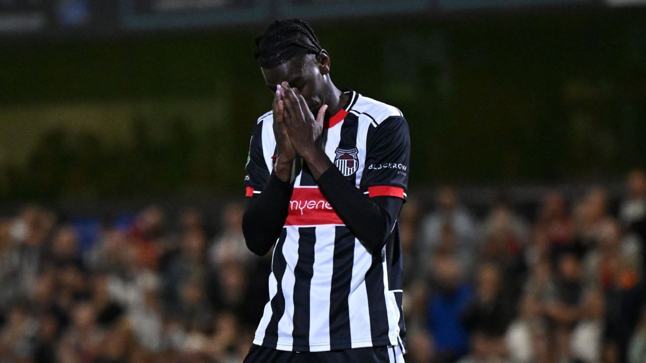 Utd-slayers Grimsby avoid banishment over error