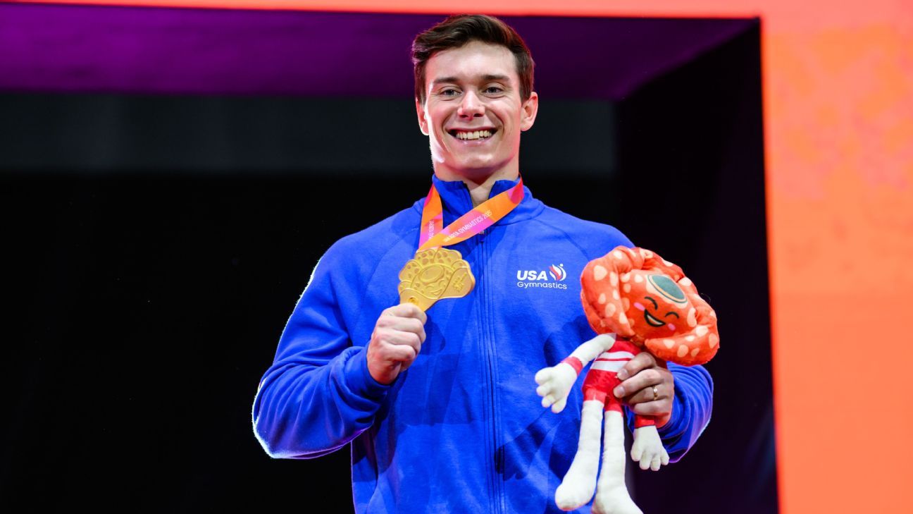 Malone wins high bar gold at gymnastics worlds