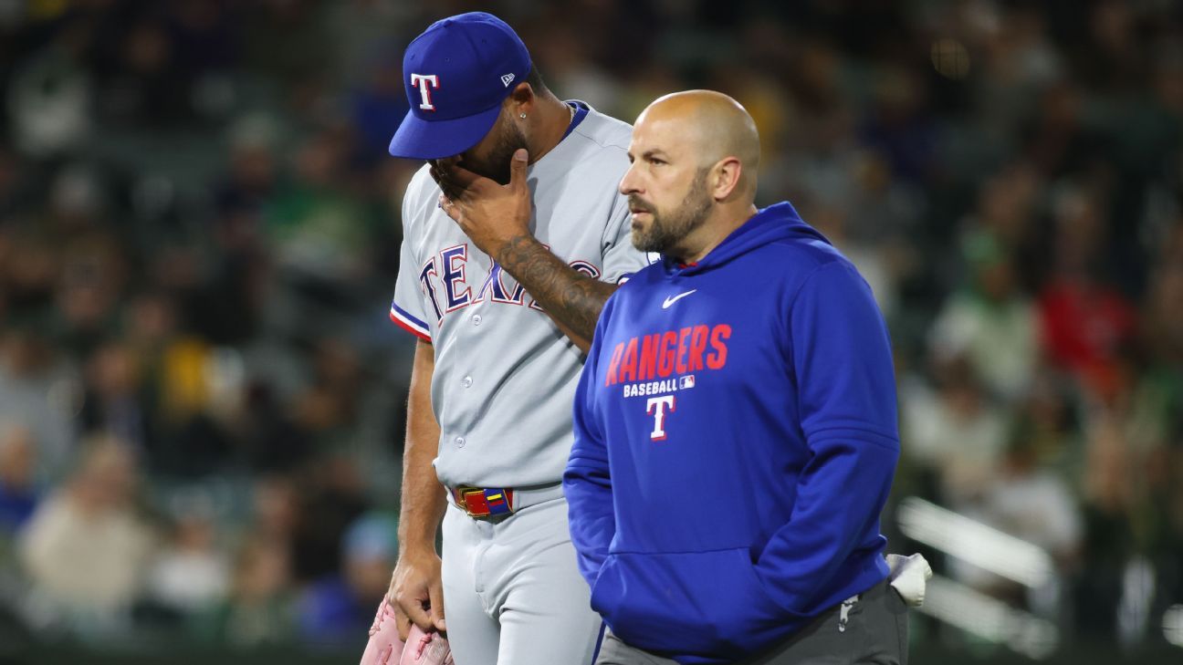 Rangers' Luis Curvelo hurt while delivering wild pitch