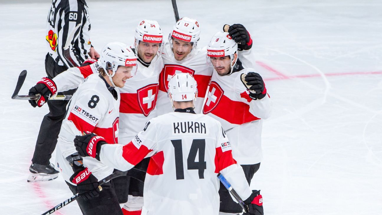 Canada holds off Sweden to open hockey worlds