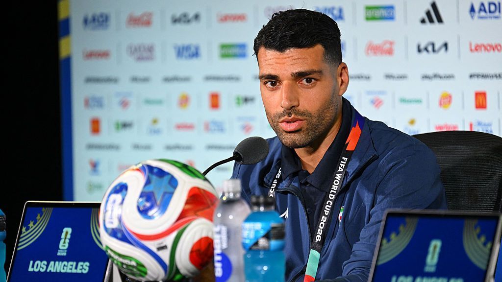 Iran team downplays protests: We aren't political
