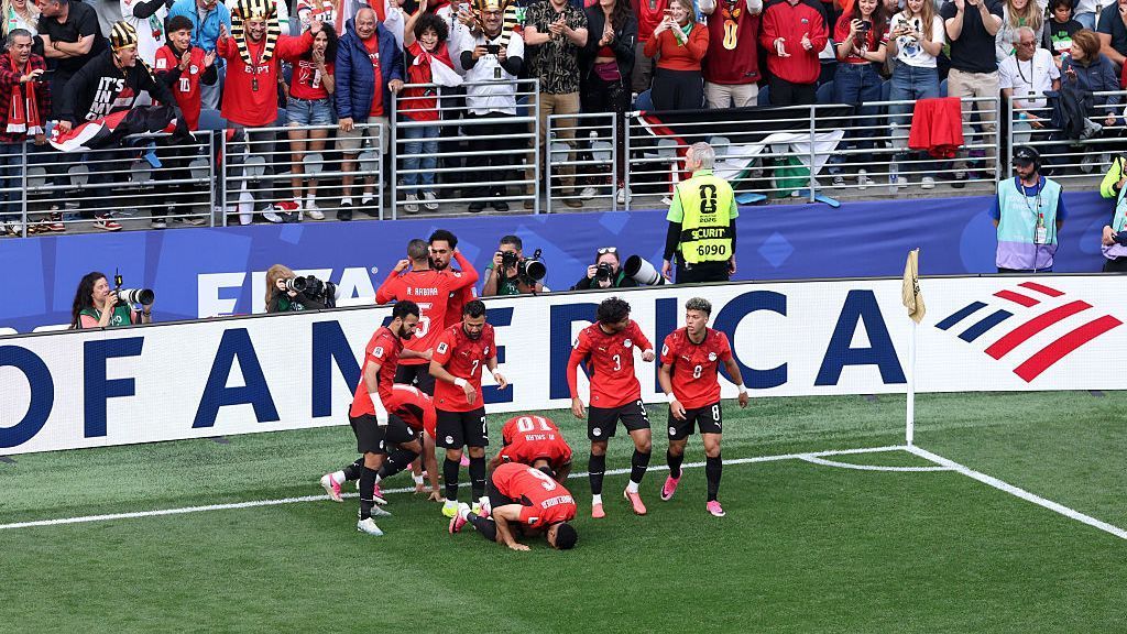 Egypt qualify after action-packed draw against Iran, as Belgium top group -- as it happened