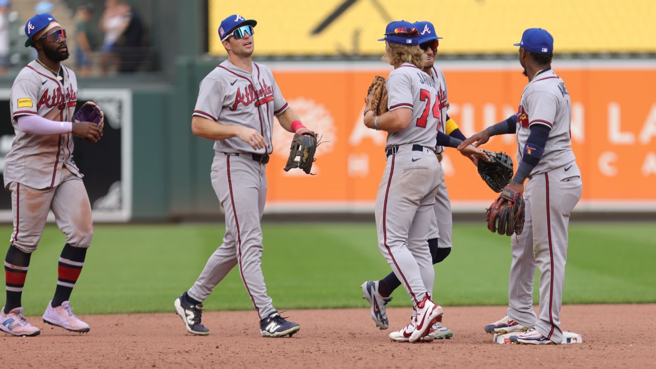Weiss' intentional walk works as Braves win in 11