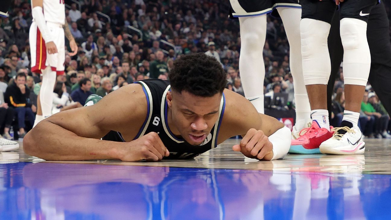 Bucks’ Giannis Antetokounmpo (R) is out for Game 2 against the Heat