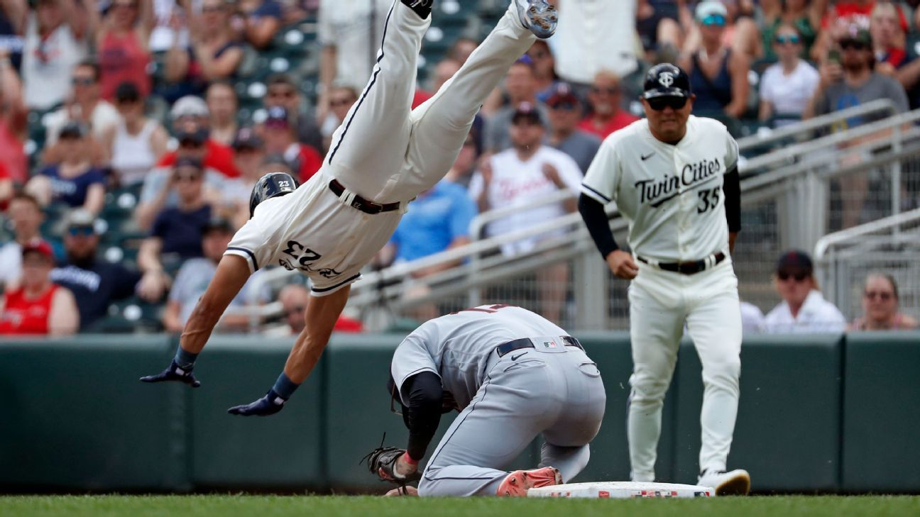 Twins' Lewis scraped, sore after scary tumble